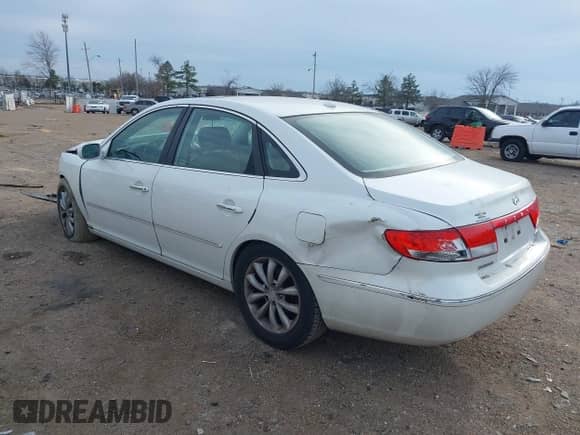 2007 Hyundai Azera SE с VIN KMHFC46F37A212413, выставлен на аукционе IAAI как лот 41458197 с пробегом 169 081 миль миль и . История ставок и продаж доступна на DreamBid. Изображение 3.
