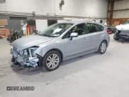 ✅ 2016 Subaru Impreza Premium • VIN: JF1GPAB63G8249458 • Lot: 43653949. Listed on IAAI with 82,311 mi. Free auction sales archive from the USA and detailed vehicle history report at DreamBid. Image 2.