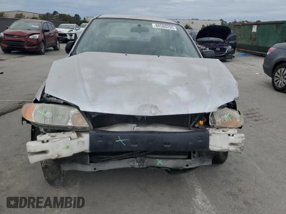 ✅ 2001 Mazda Protege DX • VIN: JM1BJ222310425181 • Lot: 88560255. Wystawiony na Copart z przebiegiem 201 942 mil. Bezpłatny archiwum sprzedaży aukcyjnych z USA i szczegółowy raport historii pojazdu na DreamBid. Zdjęcie 5.