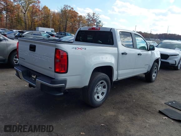✅ 2021 Chevrolet Colorado 4WD Work Truck • VIN: 1GCGTBEN6M1129902 • Лот: 43556456. Опубликован ранее на IAAI с пробегом 103 553 миль. Бесплатный доступ к архиву аукционных продаж из США и подробный отчёт об истории автомобиля на DreamBid. Изображение 4.