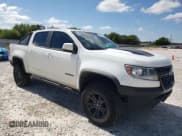 ✅ 2020 Chevrolet Colorado 4WD ZR2 • VIN: 1GCGTEEN5L1134024 • Лот: 71280004. Опубликован ранее на Copart с пробегом 58 288 миль. Бесплатный доступ к архиву аукционных продаж из США и подробный отчёт об истории автомобиля на DreamBid. Изображение 4.