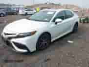 2021 Toyota Camry SE with VIN 4T1T11BK4MU025539, listed as a IAAI auction lot 42898008 with 26,083 mi miles and . Bid and sale history available at DreamBid. Image 2.