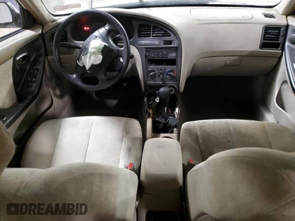 2003 Hyundai Elantra GLS z VIN KMHDN45D23U489919, wystawiony jako Copart lot #83390934 z przebiegiem Nie podano mil oraz Szkoda całkowita • Salvage title. Historia ofert i sprzedaży dostępna na DreamBid. Obrazek 8.