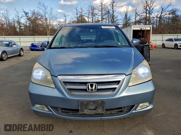 ✅ 2006 Honda Odyssey EX-L • VIN: 5FNRL38776B070297 • Лот: 95570655. Опубликован ранее на Copart с пробегом 124 763 миль. Бесплатный доступ к архиву аукционных продаж из США и подробный отчёт об истории автомобиля на DreamBid. Изображение 5.