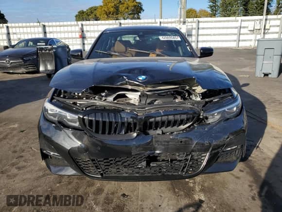 2022 BMW 3 Series 330i z VIN 3MW5R1J00N8C41955, wystawiony jako Copart lot #42669585 z przebiegiem 36 851 mil mil oraz Nie do naprawy • Non repairable. Historia ofert i sprzedaży dostępna na DreamBid. Obrazek 5.
