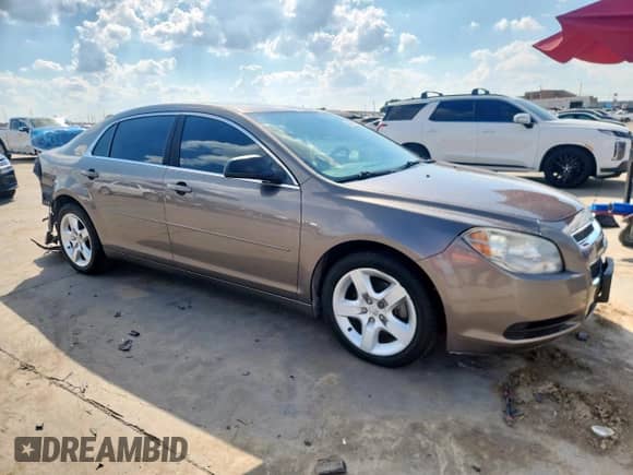 2012 Chevrolet Malibu 1LS с VIN 1G1ZB5E00CF159294, выставлен на аукционе Copart как лот 84747615 с пробегом 140 673 миль миль и Списание • Salvage title. История ставок и продаж доступна на DreamBid. Изображение 4.