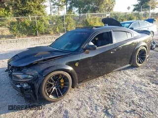 ✅ 2022 Dodge Charger SRT Hellcat Widebody • VIN: 2C3CDXL97NH121510 • Lot: 43478561. Wystawiony na IAAI z przebiegiem 42 368 mil. Bezpłatny archiwum sprzedaży aukcyjnych z USA i szczegółowy raport historii pojazdu na DreamBid. Zdjęcie 2.