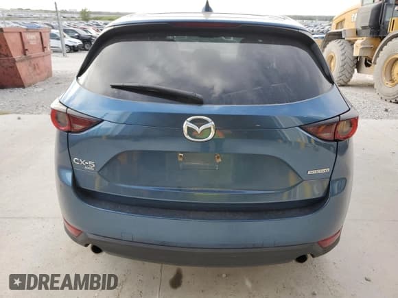 ✅ 2021 Mazda CX-5 Touring • VIN: JM3KFBCM8M1370668 • Lot: 81922665. Wystawiony na Copart z przebiegiem 86 596 mil. Bezpłatny archiwum sprzedaży aukcyjnych z USA i szczegółowy raport historii pojazdu na DreamBid. Zdjęcie 6.