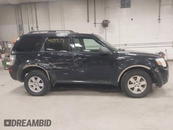 2010 Mercury Mariner with VIN 4M2CN9BG0AKJ06493, listed as a IAAI auction lot 41199173 with 143,631 mi miles and . Bid and sale history available at DreamBid. Image 14.