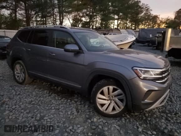 ✅ 2021 Volkswagen Atlas SEL • VIN: 1V2BR2CA9MC549827 • Lot: 91115175. Listed on Copart with 94,509 mi. Free auction sales archive from the USA and detailed vehicle history report at DreamBid. Image 4.