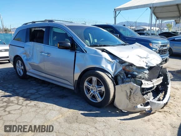 ✅ 2012 Honda Odyssey Touring • VIN: 5FNRL5H97CB033453 • Лот: 43465858. Опубликован ранее на IAAI с пробегом 195 015 миль. Бесплатный доступ к архиву аукционных продаж из США и подробный отчёт об истории автомобиля на DreamBid. Изображение 1.