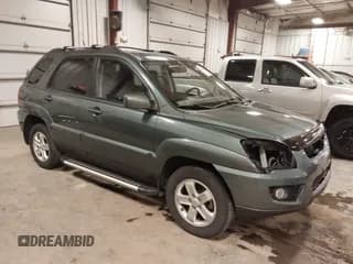 ✅ 2009 Kia Sportage LX • VIN: KNDJE723097558182 • Лот: 41295142. Опубликован ранее на IAAI с пробегом 147 200 миль. Бесплатный доступ к архиву аукционных продаж из США и подробный отчёт об истории автомобиля на DreamBid. Изображение 1.