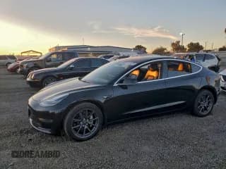 ✅ 2018 Tesla Model 3 Long Range Battery • VIN: 5YJ3E1EB8JF144476 • Лот: 95514575. Опубликован ранее на Copart с пробегом Не указан. Бесплатный доступ к архиву аукционных продаж из США и подробный отчёт об истории автомобиля на DreamBid. Изображение 1.