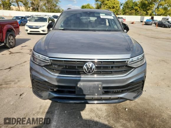 ✅ 2023 Volkswagen Tiguan SE R-Line Black • VIN: 3VVCB7AX1PM057392 • Lot: 82244115. Listed on Copart with 48,658 mi. Free auction sales archive from the USA and detailed vehicle history report at DreamBid. Image 5.