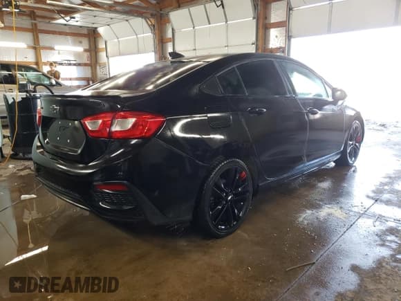 ✅ 2018 Chevrolet Cruze LT • VIN: 1G1BE5SM1J7161661 • Lot: 59702492. Listed on Copart with 99,636 mi. Free auction sales archive from the USA and detailed vehicle history report at DreamBid. Image 4.