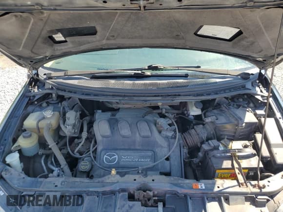 ✅ 2004 Mazda MPV LX • VIN: JM3LW28AX40508624 • Lot: 46753635. Listed on Copart with 112,230 mi. Free auction sales archive from the USA and detailed vehicle history report at DreamBid. Image 12.