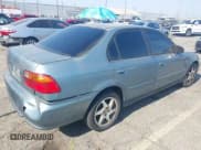 ✅ 2000 Honda Civic VP • VIN: 2HGEJ6612YH585436 • Lot: 42974673. Listed on IAAI with 241,051 mi. Free auction sales archive from the USA and detailed vehicle history report at DreamBid. Image 4.