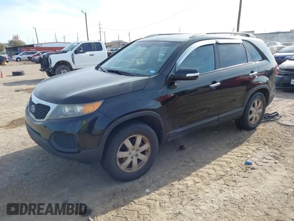 ✅ 2012 Kia Sorento LX • VIN: 5XYKT4A2XCG293038 • Lot: 42877845. Listed on IAAI with 317,059 mi. Free auction sales archive from the USA and detailed vehicle history report at DreamBid. Image 2.