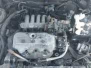 ✅ 1996 Ford Escort LX • VIN: 1FASP15J8TW140509 • Lot: 40345084. Wystawiony na IAAI z przebiegiem 146 295 mil. Bezpłatny archiwum sprzedaży aukcyjnych z USA i szczegółowy raport historii pojazdu na DreamBid. Zdjęcie 10.