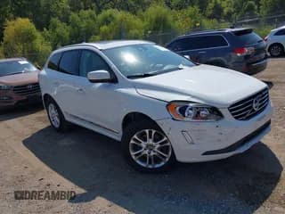 ✅ 2015 Volvo XC60 T5 Drive-E Premier • VIN: YV426MDB4F2587484 • Lot: 43176231. Listed on IAAI with 153,041 mi. Free auction sales archive from the USA and detailed vehicle history report at DreamBid. Image 1.
