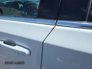 ✅ 2022 Chevrolet Traverse LT Cloth • VIN: 1GNERGKW6NJ156915 • Lot: 42398394. Wystawiony na IAAI z przebiegiem 90 113 mil. Bezpłatny archiwum sprzedaży aukcyjnych z USA i szczegółowy raport historii pojazdu na DreamBid. Zdjęcie 1.