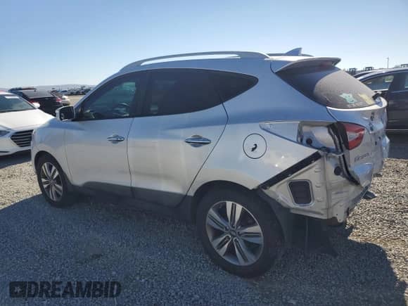 2014 Hyundai Tucson SE z VIN KM8JUCAG7EU843064, wystawiony jako Copart lot #71027575 z przebiegiem 178 099 mil mil oraz Szkoda całkowita • Salvage title. Historia ofert i sprzedaży dostępna na DreamBid. Obrazek 2.