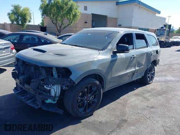 2021 Dodge Durango GT with VIN 1C4RDHDG1MC689049, listed as a IAAI auction lot 42655128 with 112,896 mi miles and . Bid and sale history available at DreamBid. Image 2.