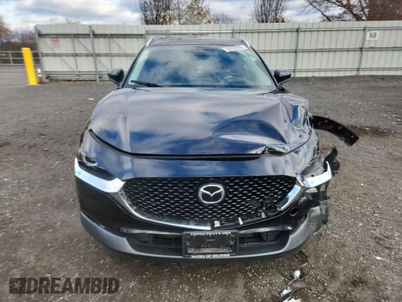 ✅ 2021 Mazda CX-30 Premium • VIN: 3MVDMBDM0MM218214 • Lot: 92629905. Listed on Copart with 75,604 mi. Free auction sales archive from the USA and detailed vehicle history report at DreamBid. Image 5.