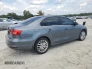 ✅ 2015 Volkswagen Jetta SE • VIN: 3VWD07AJ8FM318503 • Lot: 82072295. Listed on Copart with 77,037 mi. Free auction sales archive from the USA and detailed vehicle history report at DreamBid. Image 3.