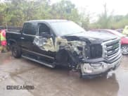 ✅ 2018 GMC Sierra 1500 SLT • VIN: 3GTU2NEC5JG130901 • Lot: 43286669. Listed on IAAI with 169,214 mi. Free auction sales archive from the USA and detailed vehicle history report at DreamBid. Image 1.