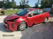 2021 Toyota Prius L Eco with VIN JTDKAMFU3M3146825, listed as a Copart auction lot 66119045 with 324,709 mi miles and Non repairable. Bid and sale history available at DreamBid. Image 1.