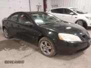 ✅ 2009 Pontiac G6 1SA • VIN: 1G2ZG57B994171248 • Lot: 42335463. Listed on IAAI with 169,611 mi. Free auction sales archive from the USA and detailed vehicle history report at DreamBid. Image 1.