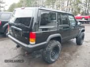 ✅ 1998 Jeep Cherokee Sport • VIN: 1J4FJ68S1WL266581 • Lot: 41446293. Listed on IAAI with 149,202 mi. Free auction sales archive from the USA and detailed vehicle history report at DreamBid. Image 4.