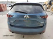 ✅ 2021 Mazda CX-5 Touring • VIN: JM3KFBCM8M1370668 • Lot: 81922665. Wystawiony na Copart z przebiegiem 86 596 mil. Bezpłatny archiwum sprzedaży aukcyjnych z USA i szczegółowy raport historii pojazdu na DreamBid. Zdjęcie 6.