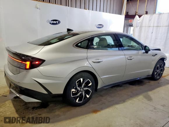 ✅ 2025 Hyundai Sonata SEL • VIN: KMHL64JA4SA454898 • Лот: 90748365. Опубликован ранее на Copart с пробегом 19 676 миль. Бесплатный доступ к архиву аукционных продаж из США и подробный отчёт об истории автомобиля на DreamBid. Изображение 3.