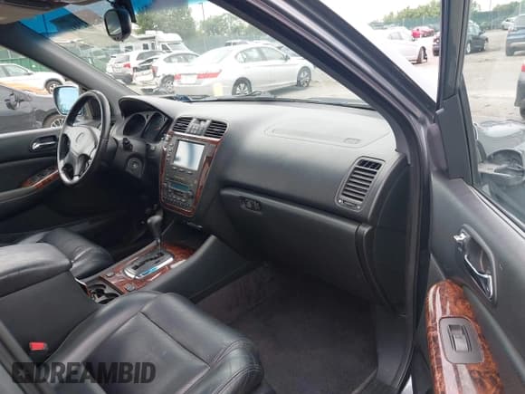 ✅ 2001 Acura MDX Touring • VIN: 2HNYD18681H529547 • Lot: 42682981. Wystawiony na IAAI z przebiegiem 174 902 mil. Bezpłatny archiwum sprzedaży aukcyjnych z USA i szczegółowy raport historii pojazdu na DreamBid. Zdjęcie 5.