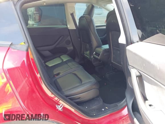 ✅ 2023 Tesla Model Y Long Range • VIN: 7SAYGAEE7PF691499 • Lot: 42038850. Listed on IAAI with 26,439 mi. Free auction sales archive from the USA and detailed vehicle history report at DreamBid. Image 8.