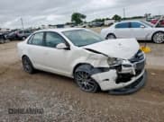 ✅ 2010 Volkswagen Jetta Limited Edition • VIN: 3VWRZ7AJ8AM165531 • Lot: 58623515. Listed on Copart with 166,829 mi. Free auction sales archive from the USA and detailed vehicle history report at DreamBid. Image 4.