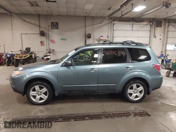 ✅ 2009 Subaru Forester X • VIN: JF2SH63639H719392 • Lot: 43096579. Listed on IAAI with 123,436 mi. Free auction sales archive from the USA and detailed vehicle history report at DreamBid. Image 14.
