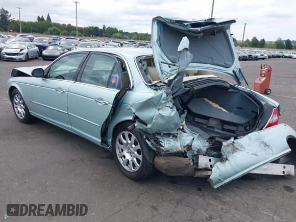 ✅ 2004 Jaguar XJ 8 • VIN: SAJWA71C84SG28931 • Lot: 43217994. Listed on IAAI with 62,752 mi. Free auction sales archive from the USA and detailed vehicle history report at DreamBid. Image 3.