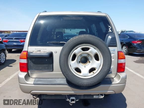 ✅ 2003 Suzuki XL7 Touring • VIN: JS3TX92V534103046 • Lot: 41978971. Listed on IAAI with 185,038 mi. Free auction sales archive from the USA and detailed vehicle history report at DreamBid. Image 16.