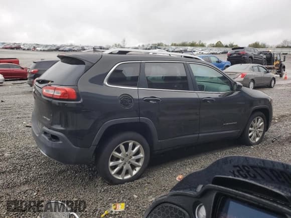✅ 2016 Jeep Cherokee Limited • VIN: 1C4PJLDB7GW229355 • Lot: 90201345. Listed on Copart with 104,632 mi. Free auction sales archive from the USA and detailed vehicle history report at DreamBid. Image 3.