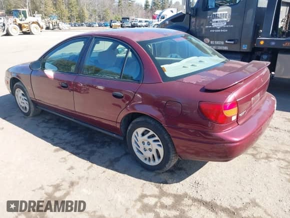 2002 Saturn SL z VIN 1G8ZF52852Z267004, wystawiony jako IAAI lot #41760974 z przebiegiem 228 165 mil mil oraz . Historia ofert i sprzedaży dostępna na DreamBid. Obrazek 3.