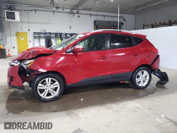 2012 Hyundai Tucson GLS z VIN KM8JU3AC2CU353030, wystawiony jako Copart lot #66072874 z przebiegiem 129 142 mil mil oraz Szkoda całkowita • Salvage title. Historia ofert i sprzedaży dostępna na DreamBid. Obrazek 1.