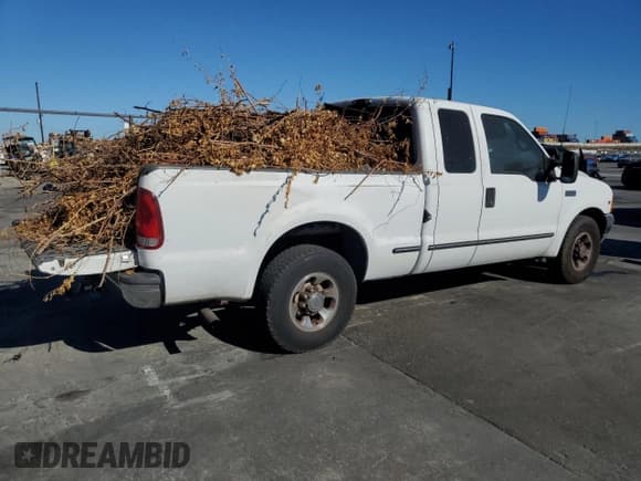 ✅ 1999 Ford F-250 XL • VIN: 1FTNX20S7XEA60174 • Лот: 80079645. Опубликован ранее на Copart с пробегом 239 590 миль. Бесплатный доступ к архиву аукционных продаж из США и подробный отчёт об истории автомобиля на DreamBid. Изображение 3.