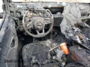 ✅ 2021 Jeep Wrangler Unlimited Sahara • VIN: 1C4HJXEG7MW593969 • Лот: 74041454. Опубликован ранее на Copart с пробегом Не указан. Бесплатный доступ к архиву аукционных продаж из США и подробный отчёт об истории автомобиля на DreamBid. Изображение 8.