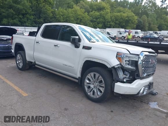 ✅ 2021 GMC Sierra 1500 Denali • VIN: 3GTU9FEL0MG255150 • Lot: 43060209. Wystawiony na IAAI z przebiegiem 56 711 mil. Bezpłatny archiwum sprzedaży aukcyjnych z USA i szczegółowy raport historii pojazdu na DreamBid. Zdjęcie 1.