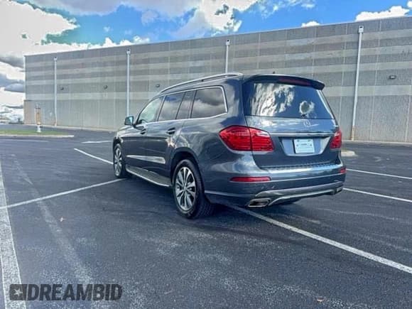 ✅ 2015 Mercedes-Benz GL 450 • VIN: 4JGDF6EE6FA498694 • Лот: 95998535. Опубликован ранее на Copart с пробегом 164 620 миль. Бесплатный доступ к архиву аукционных продаж из США и подробный отчёт об истории автомобиля на DreamBid. Изображение 3.