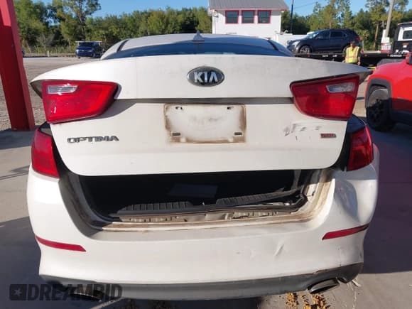✅ 2014 Kia Optima LX • VIN: KNAGM4A71E5522942 • Lot: 43708941. Listed on IAAI with 165,799 mi. Free auction sales archive from the USA and detailed vehicle history report at DreamBid. Image 16.