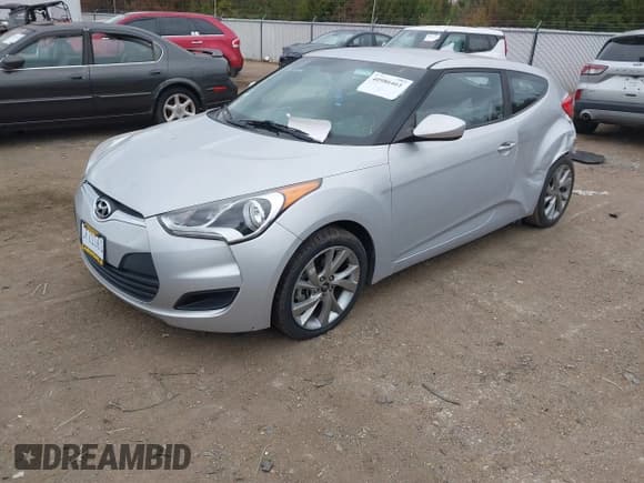 ✅ 2016 Hyundai Veloster • VIN: KMHTC6AD9GU291251 • Lot: 40986461. Wystawiony na IAAI z przebiegiem 81 061 mil. Bezpłatny archiwum sprzedaży aukcyjnych z USA i szczegółowy raport historii pojazdu na DreamBid. Zdjęcie 2.